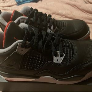 Retro 4 shoes worn once with a scrap on the side  but still like brand new